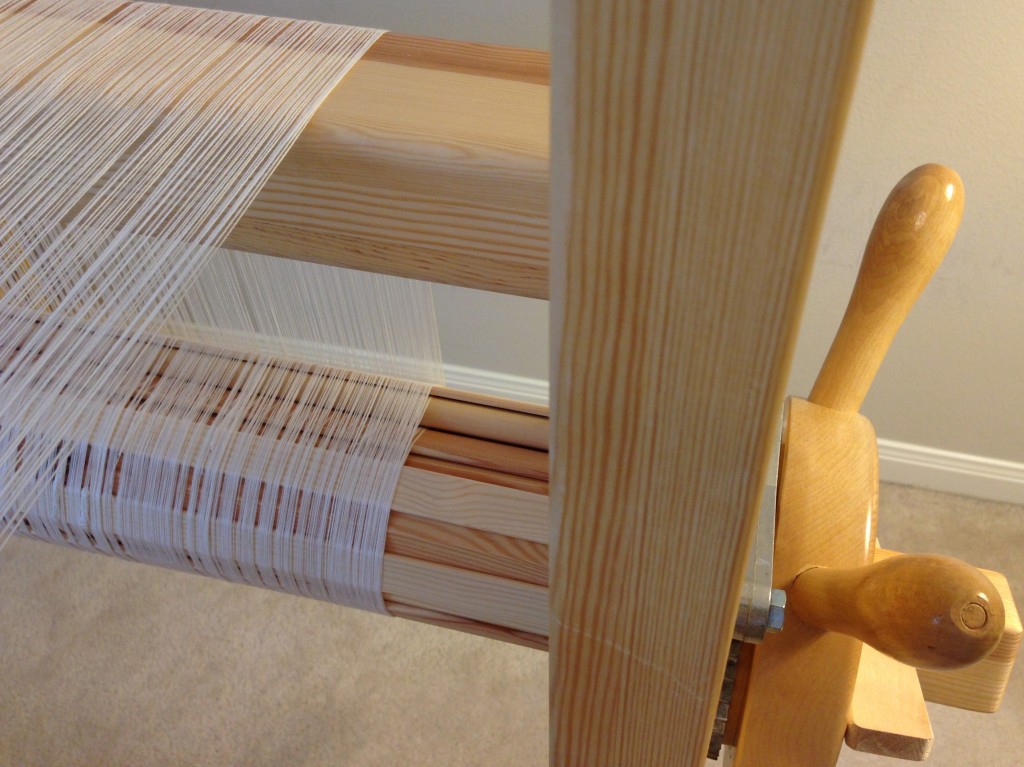 Warping the loom for cotton curtains