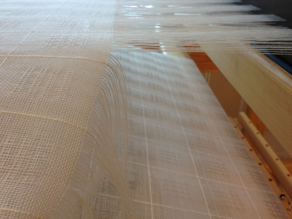 Cutting off Swedish lace from the loom.
