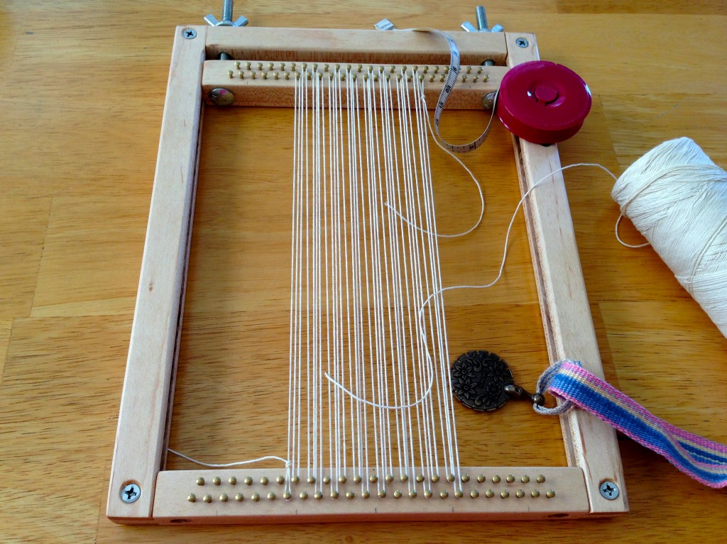Hand-built miniature tapestry loom, size of an iPad, for travel.
