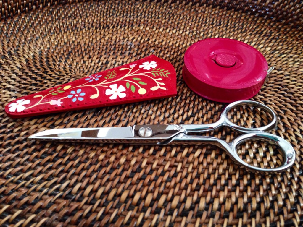 Painted leather sheath for scissors, from the Philippines.