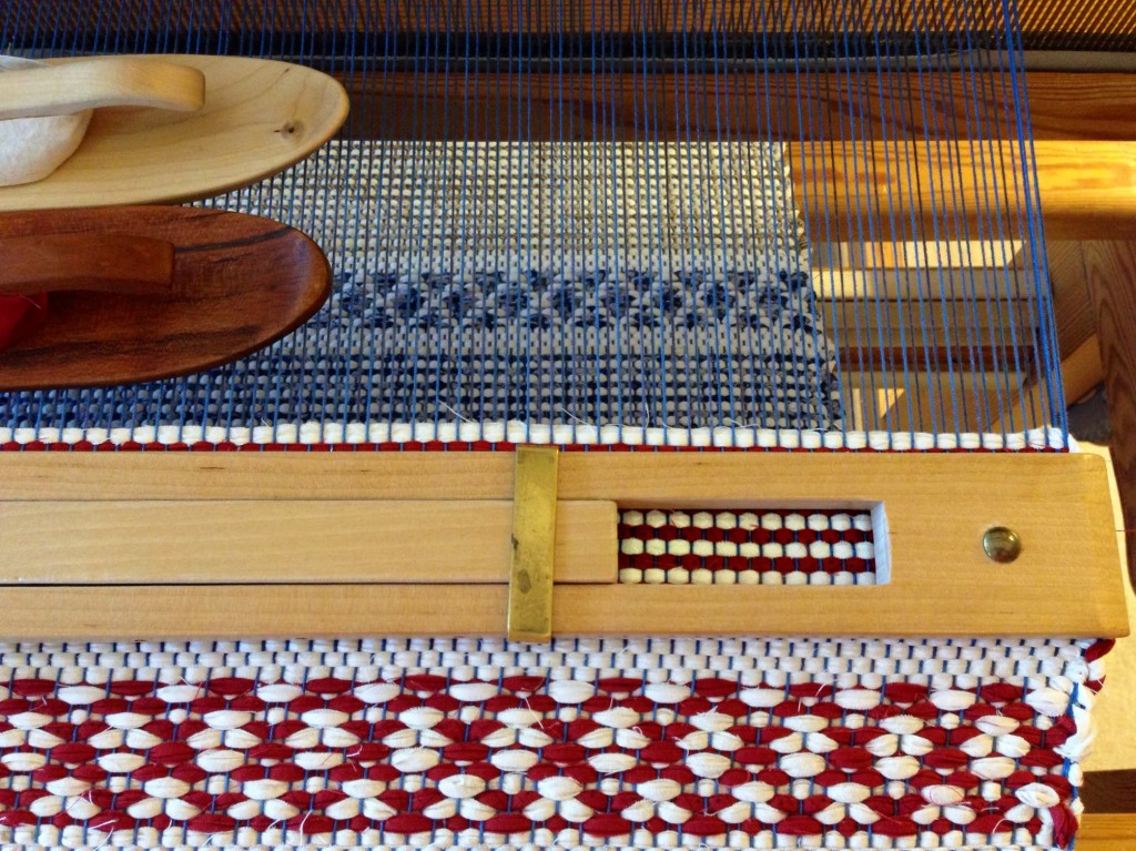 Temple in use while weaving rag rug.