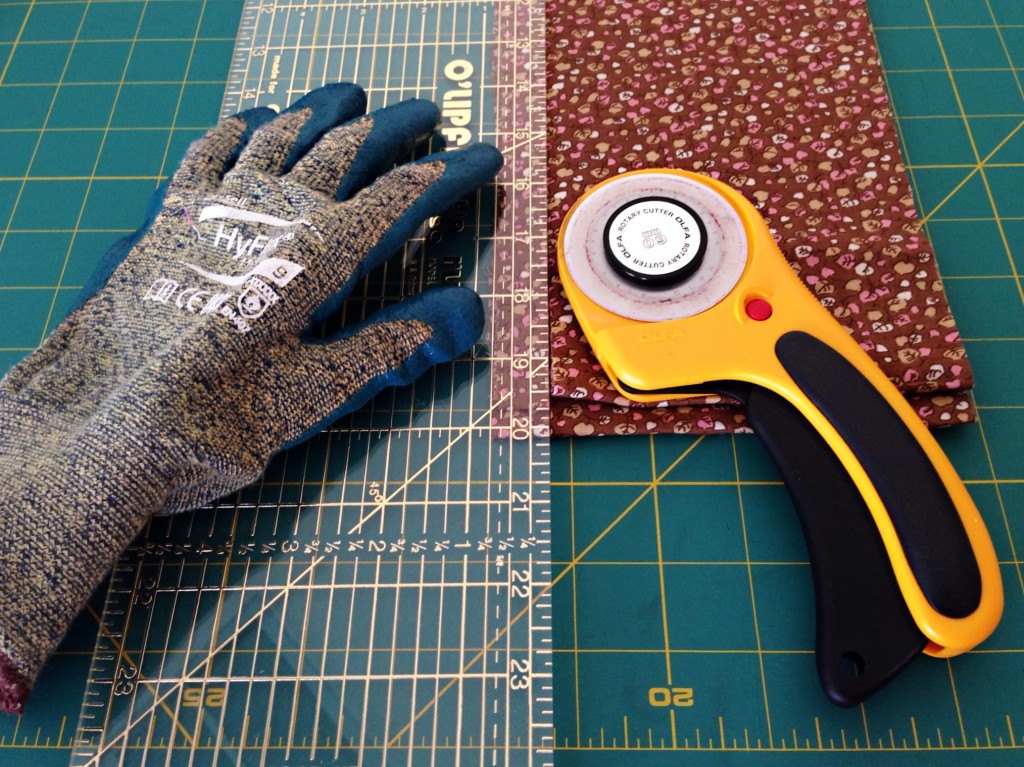 Tools for cutting fabric into strips for rag rugs.