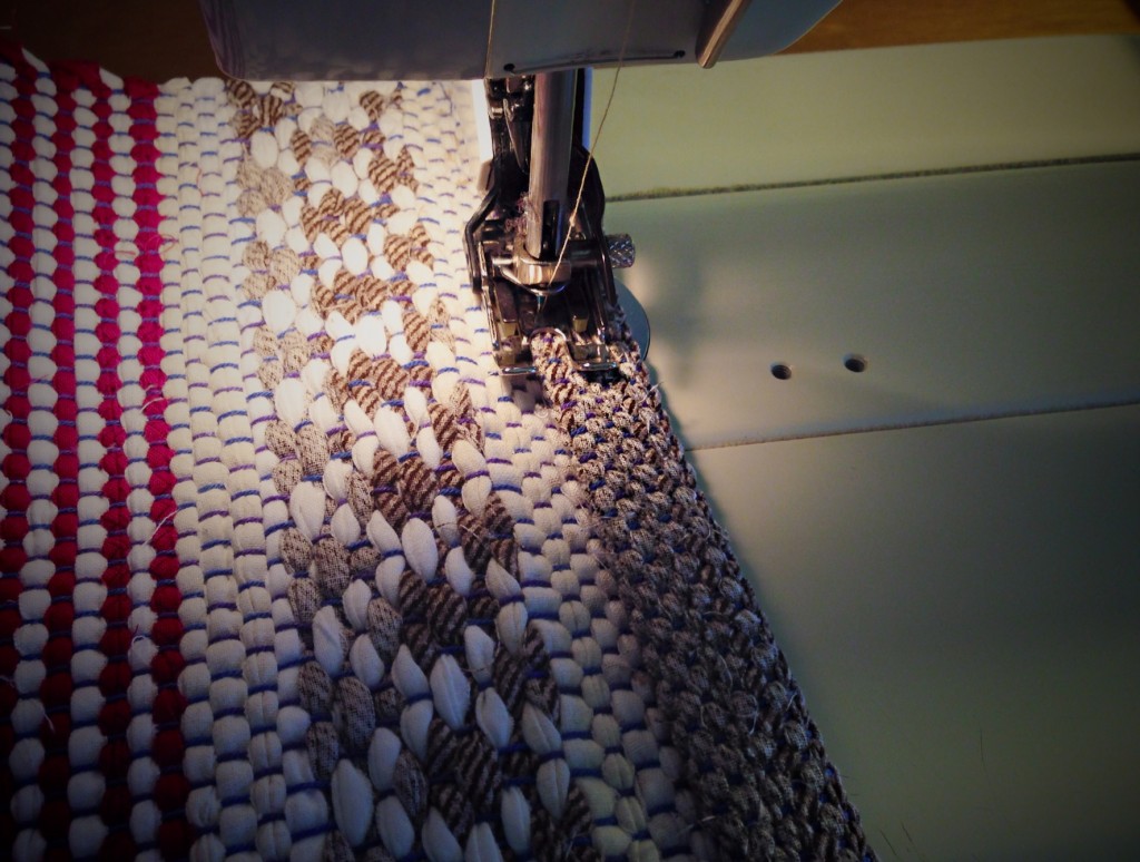 Stitching rag rug hem. Steps for finishing rag rugs.