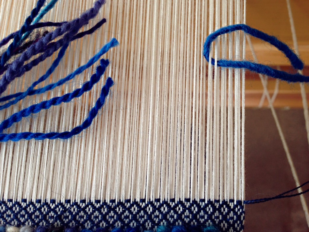 Rya first step - around 2 doubled warp ends.