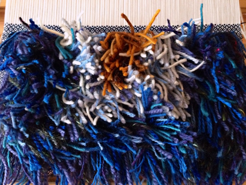 47 rya knots across each row, forming a shaggy pillow top. Karen Isenhower