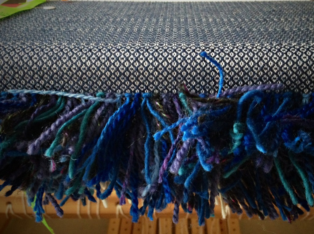 Rya knots for pillow. Back of pillow being woven in background weft.