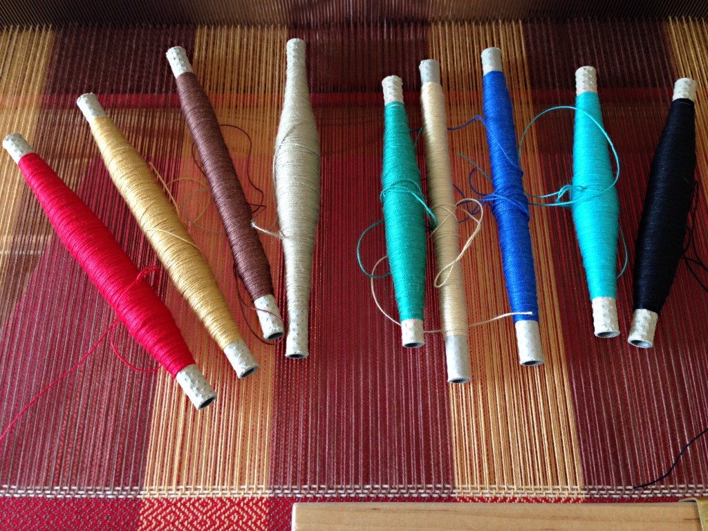 Nine quills of 16/2 cotton. Colorful towel up next.