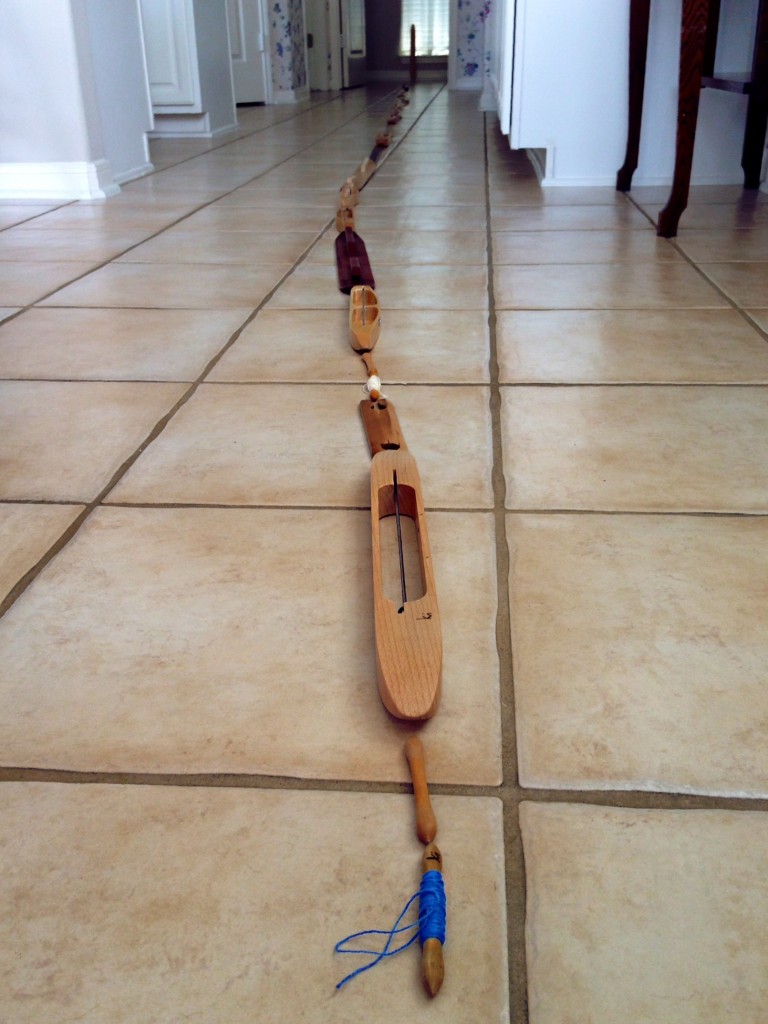 34 1/2 feet of weaving shuttles.