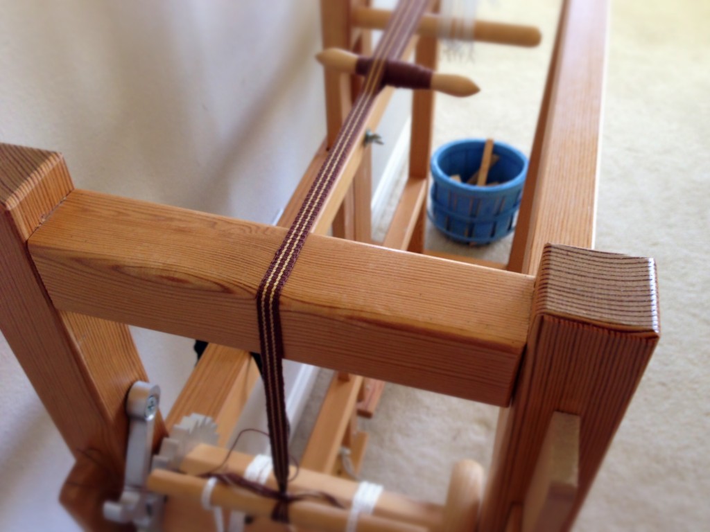 Band loom weaving, making hanging tabs for handwoven towels.