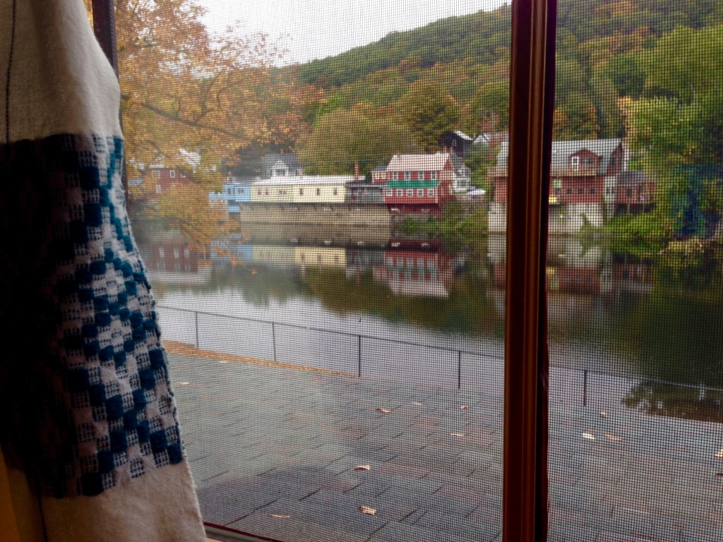 Handwoven curtains frame the view at Vavstuga student quarters.