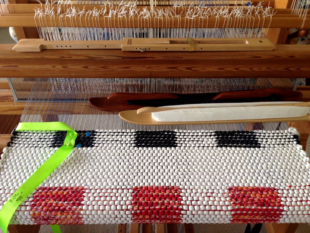 Double-binding rag rug on the loom.