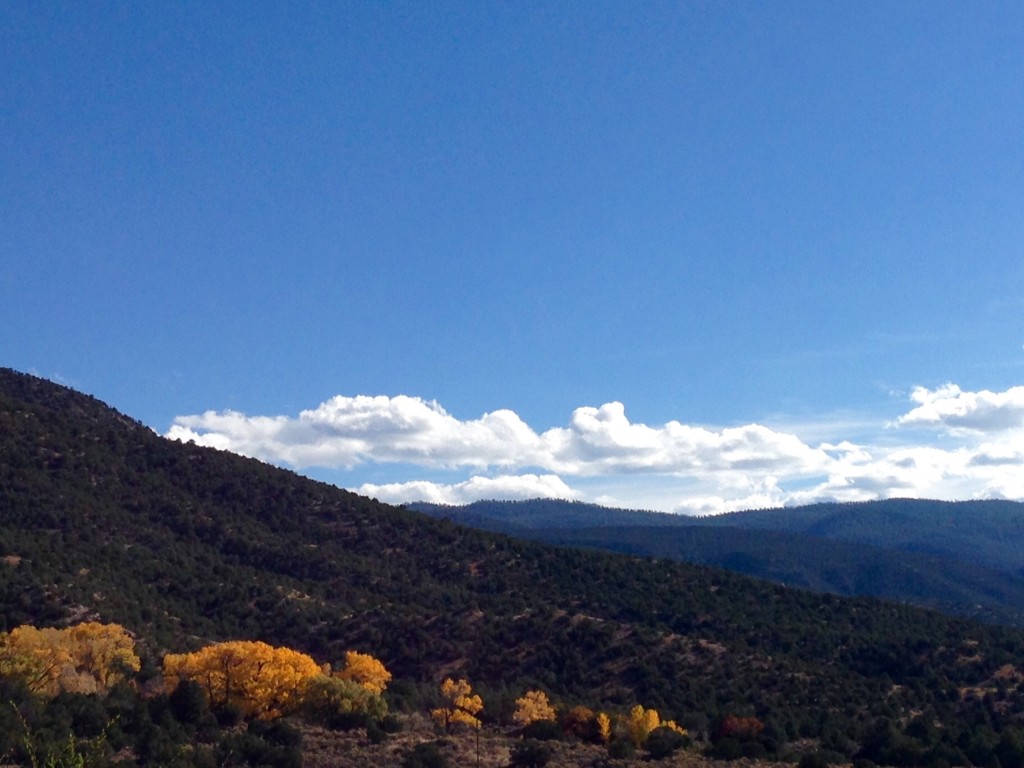 Majestic mountains and colorful cottonwood trees in New Mexico.