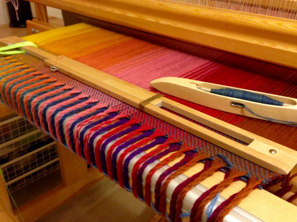 Fringe, twisted on the loom, at the beginning of the wool blanket. Follow progress.