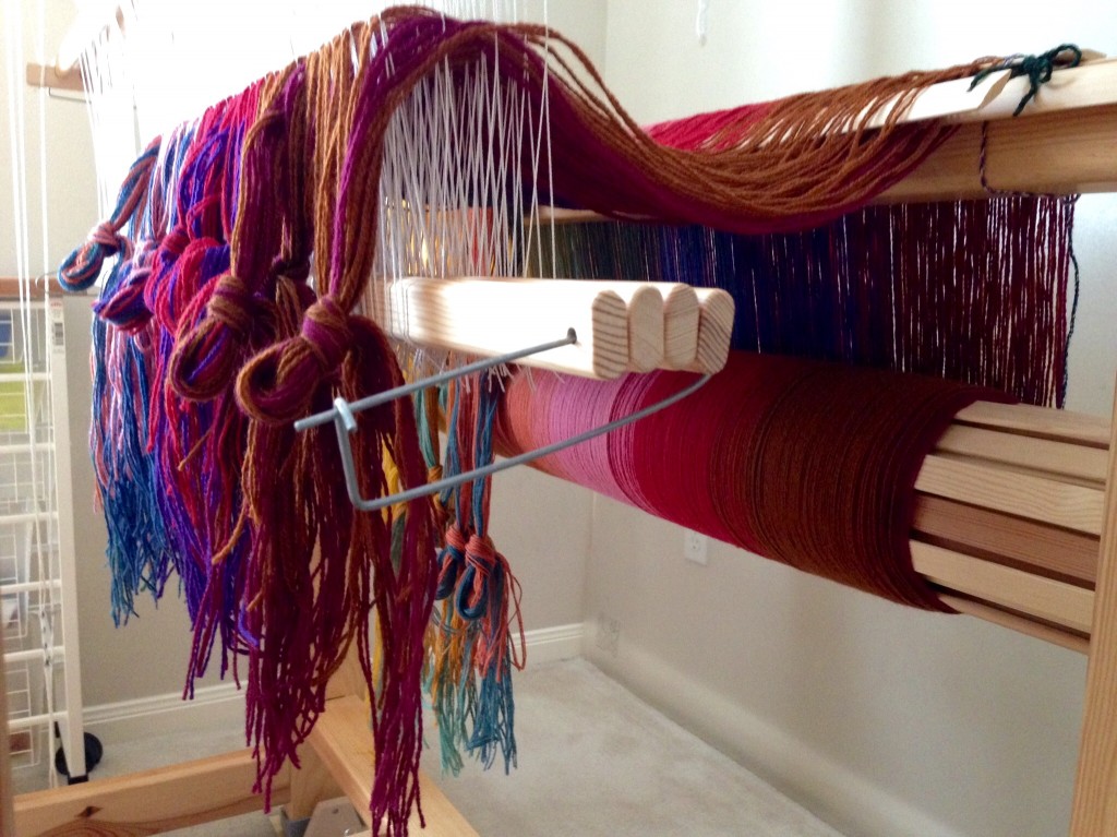 Threading heddles for multi-color wool blanket.