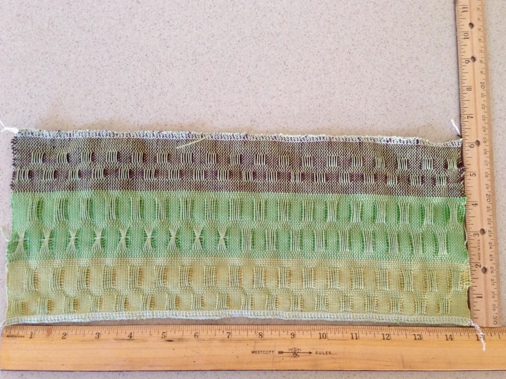 Sample of lace weave with warp floats - before washing and drying.