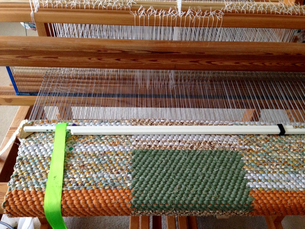 Double-binding twill rag rug on the loom.