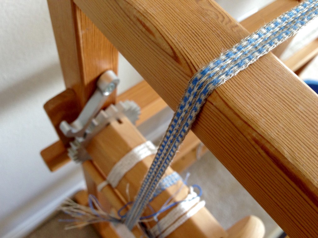 Linen band weaving on Glimakra two-treadle band loom.