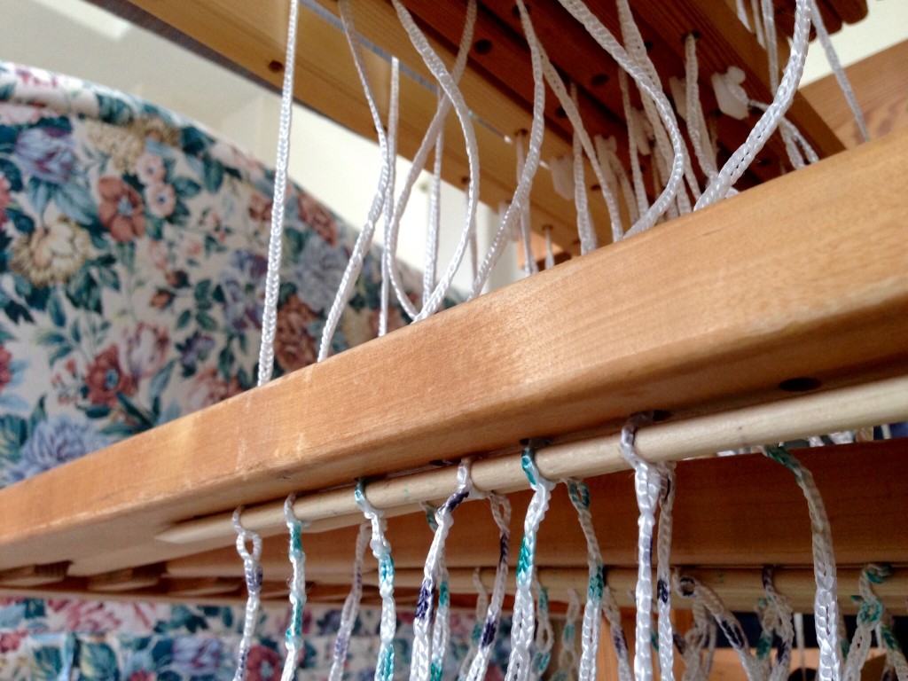 Underneath view of Vavstuga treadle tie-up system. Makes changing tie-ups a breeze.
