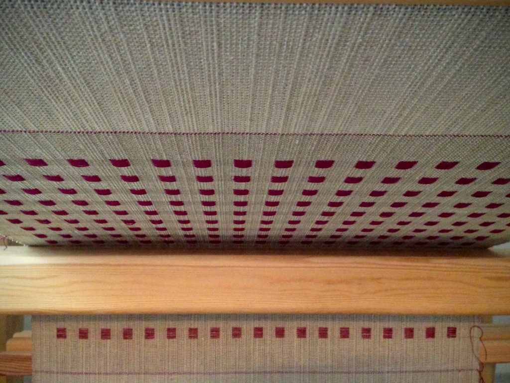 Dice weave on the loom. View from under the weaving.