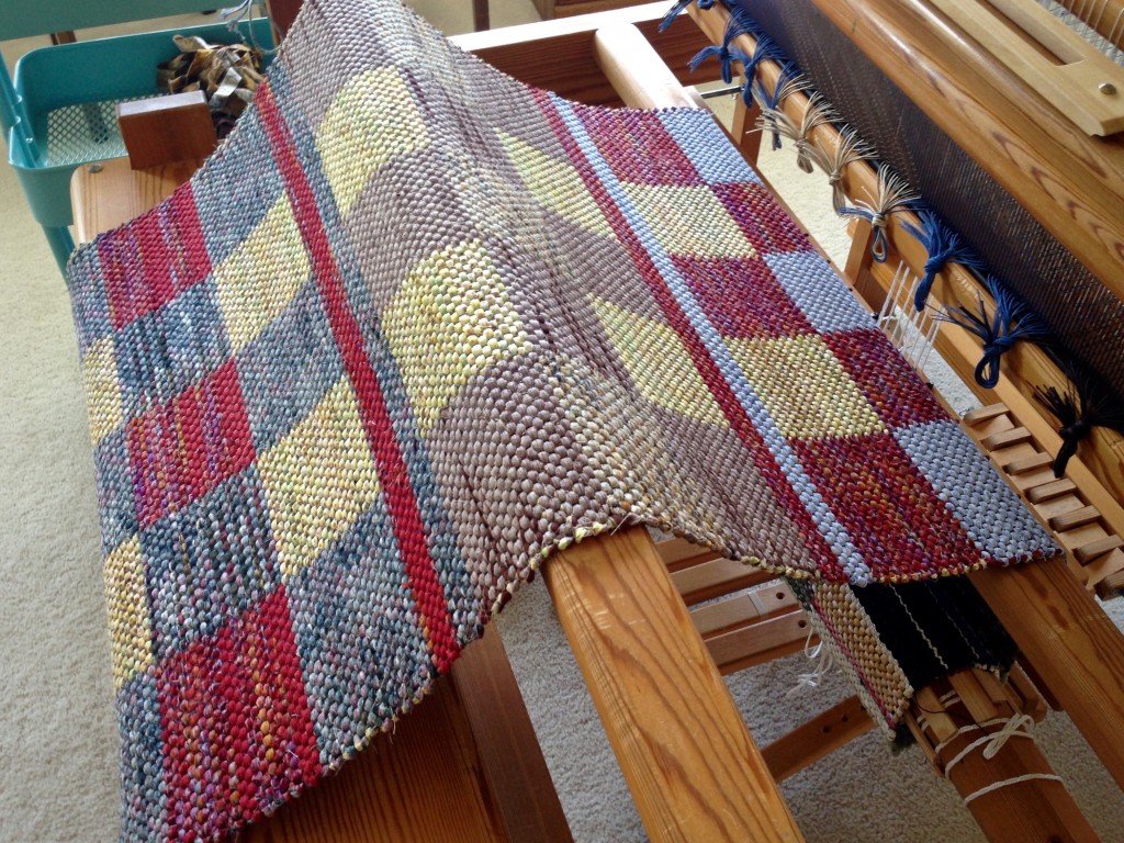 Rag rug unrolled from the loom. Karen Isenhower