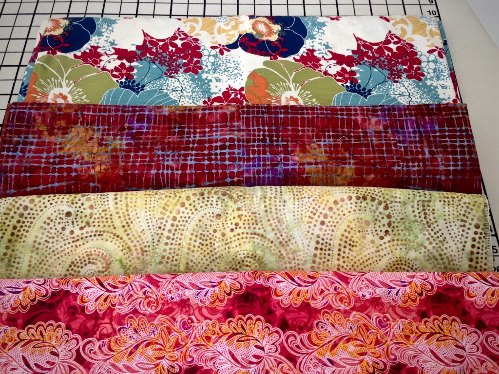 Choosing fabric for double binding rag rug.