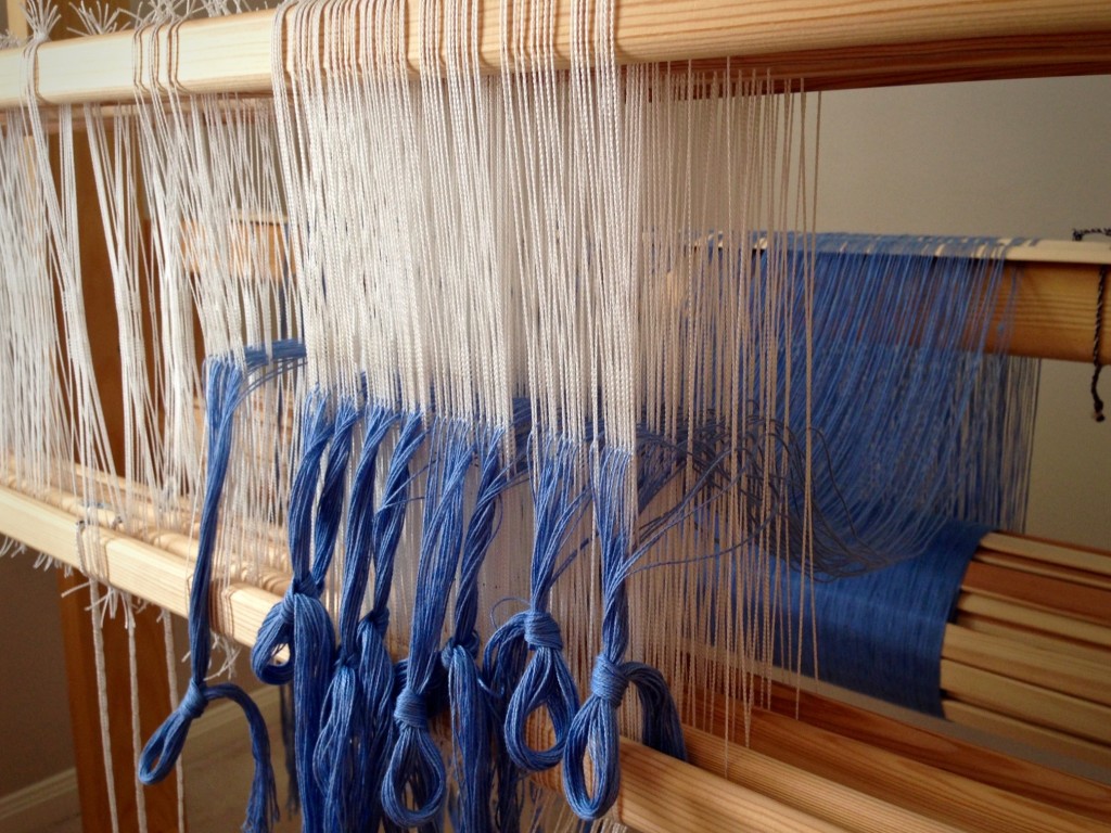 Threading heddles with Bockens 8/2 cotton.