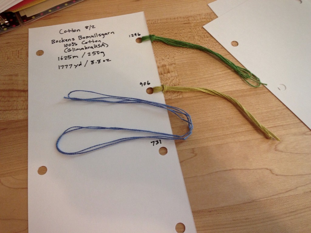 Adding yarn to yarn record book.