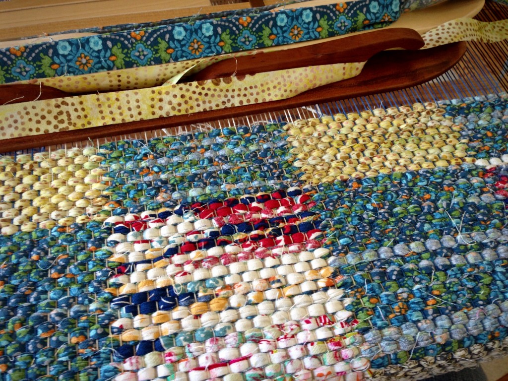 Two ski shuttles for weaving double binding rag rugs.