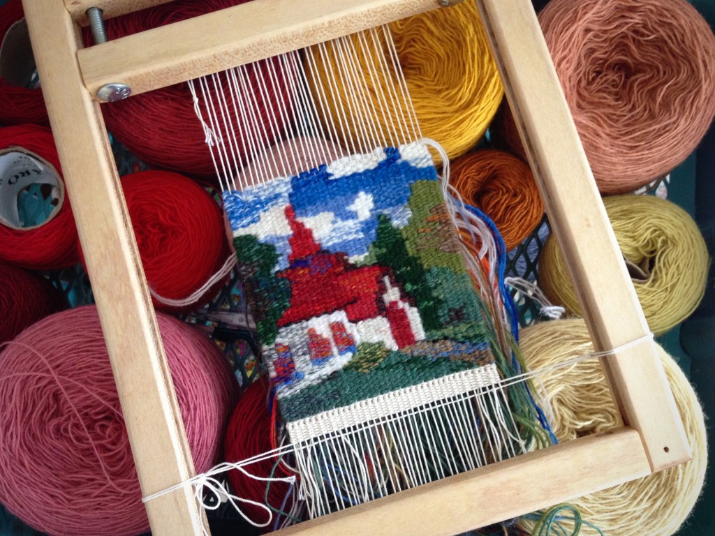 Adding a cross to the small chapel steeple.