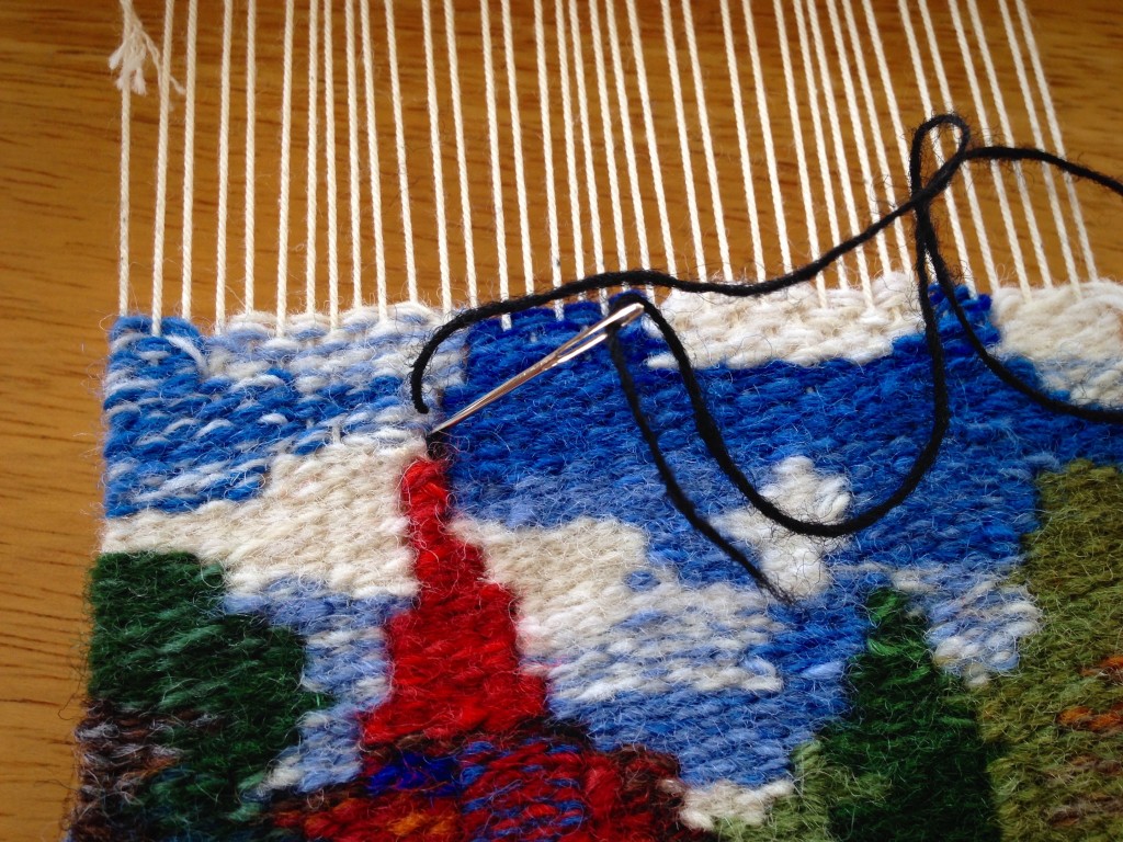 Embroidery on a small tapestry.