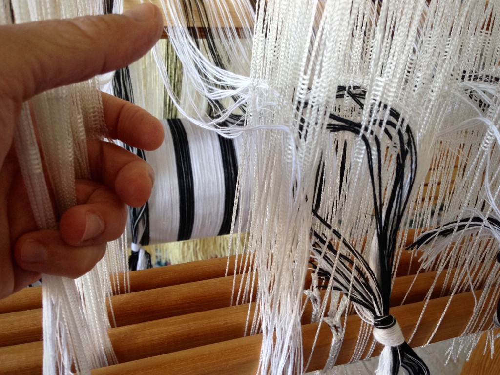 Threading Texsolv heddles.