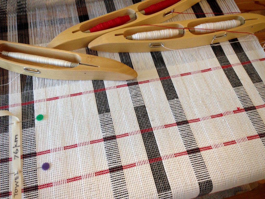 Black and white and a little red all over. Towels.