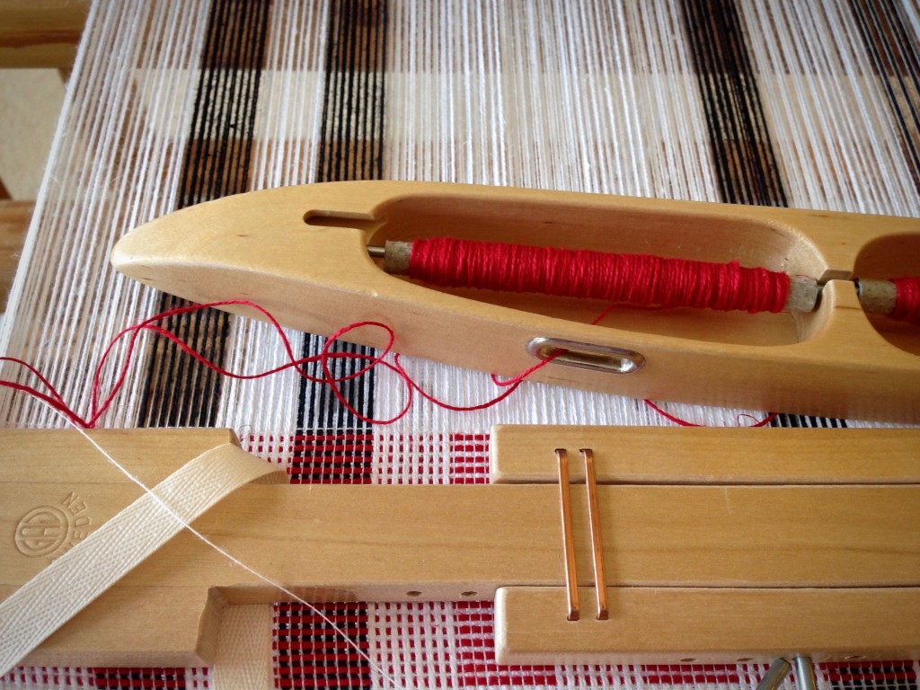 Hand towels on the loom with cotton/linen thread in the double bobbin shuttle.
