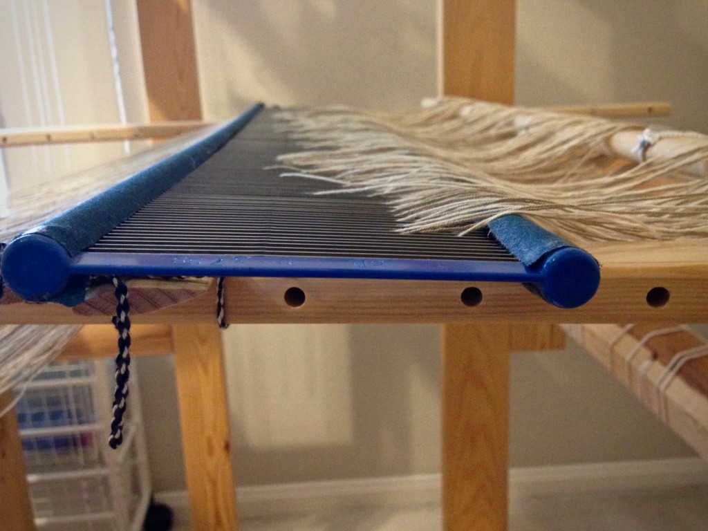 Dressing the loom starts with pre-sleying the reed.