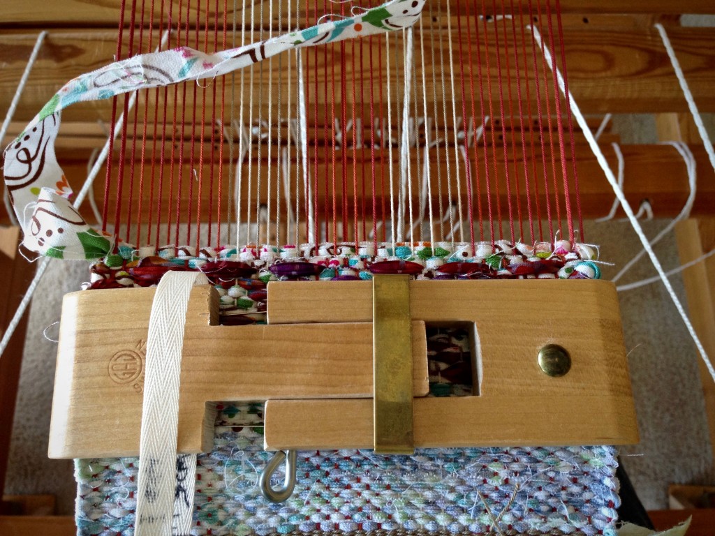 Teeny tiny temple in place on miniature rag rug. (6 1/2")