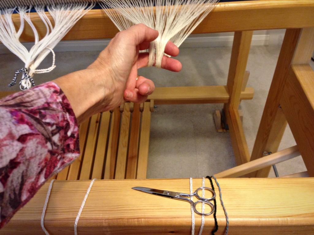 Cutting ends after beaming the warp.
