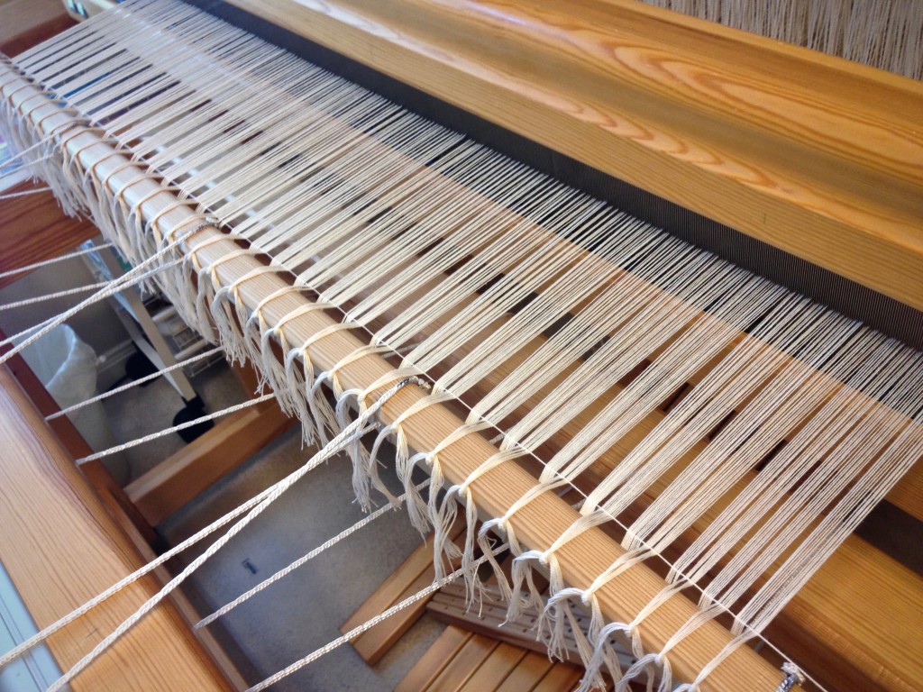 Cotton warp with leveling string, getting ready to weave monksbelt!