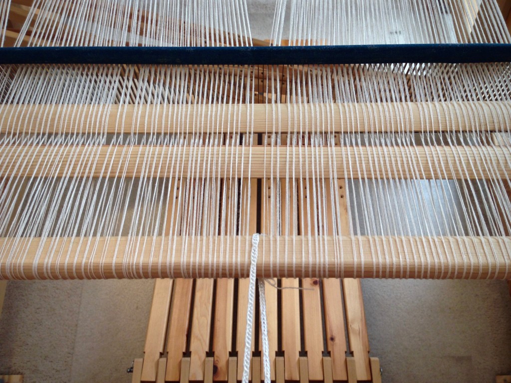 Winding on a new warp. Back to front warping pics.