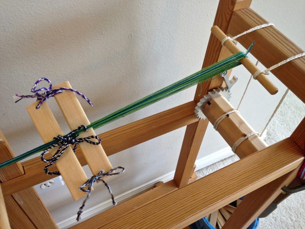 Warping the band loom tutorial.