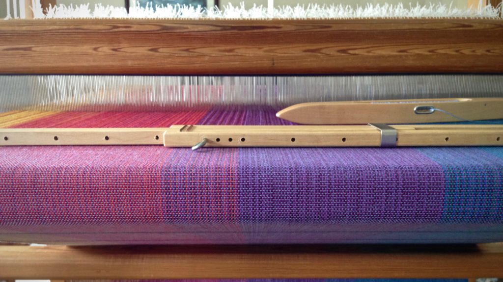 Woven baby wrap on the loom. Karen Isenhower