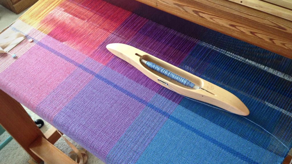 Woven baby wrap on the loom. Karen Isenhower