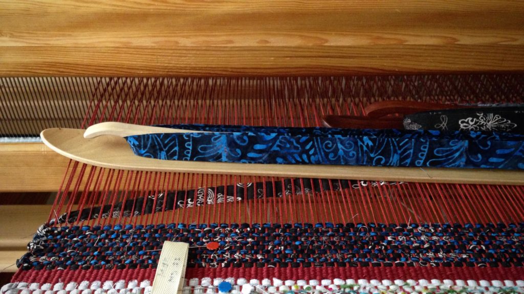Beginning of rag rug using beautiful blue batik fabric.