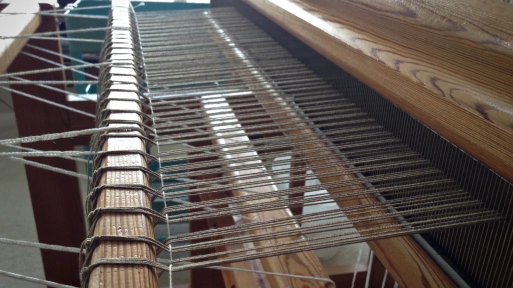 This is when the loom looks like a musical instrument, ready to be strummed.