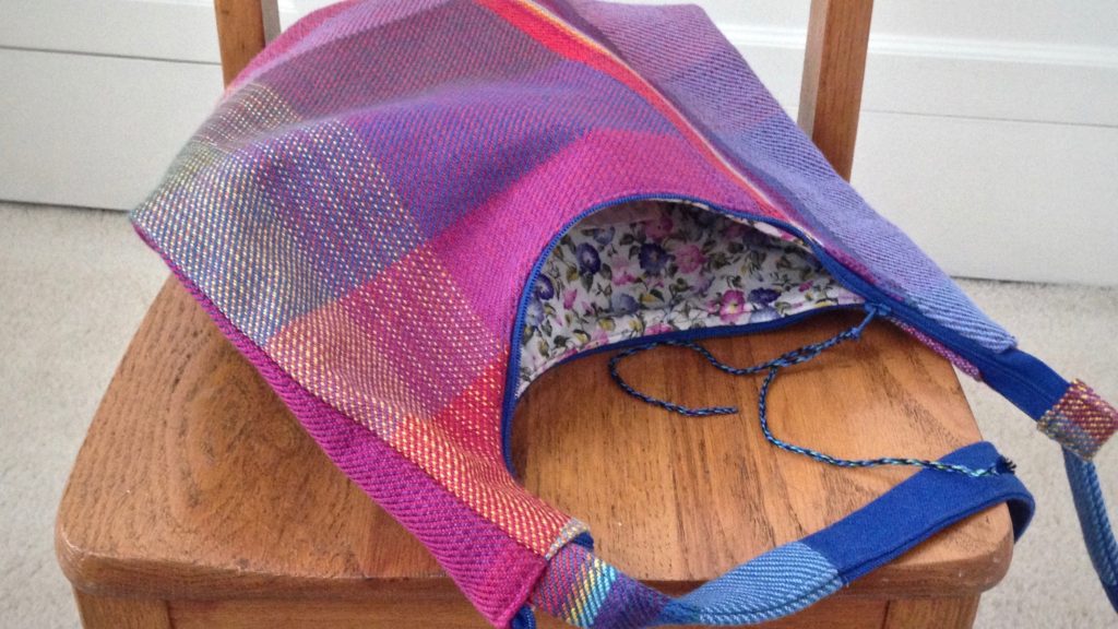 Handbag made from handwoven fabric.