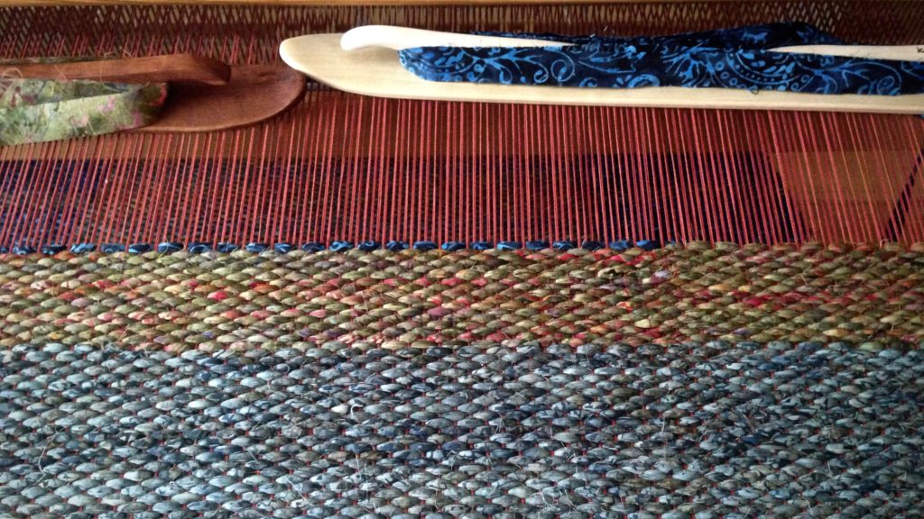 Double binding rag rug on the loom.