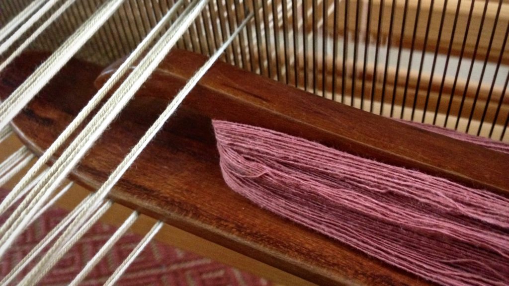 Weaving with string yarn, and using floating selvedges.