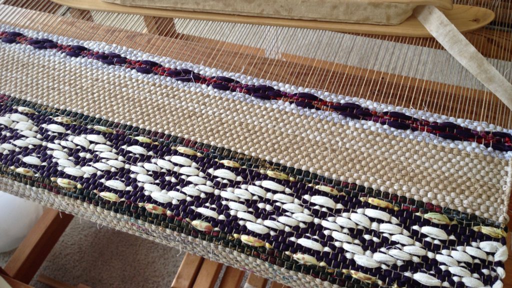 Rosepath rag rug on the loom.