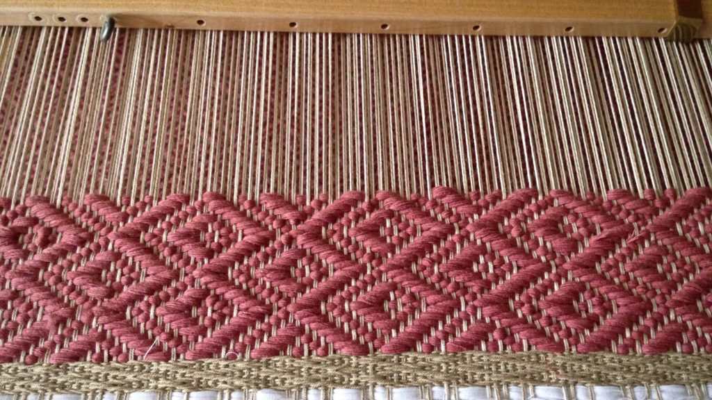 Stringyarn weft for 8-shaft block twill rug.