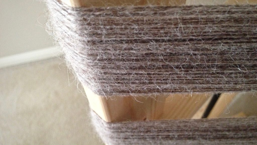 100% alpaca in a 3-ply yarn, preparing warp for weaving scarves.