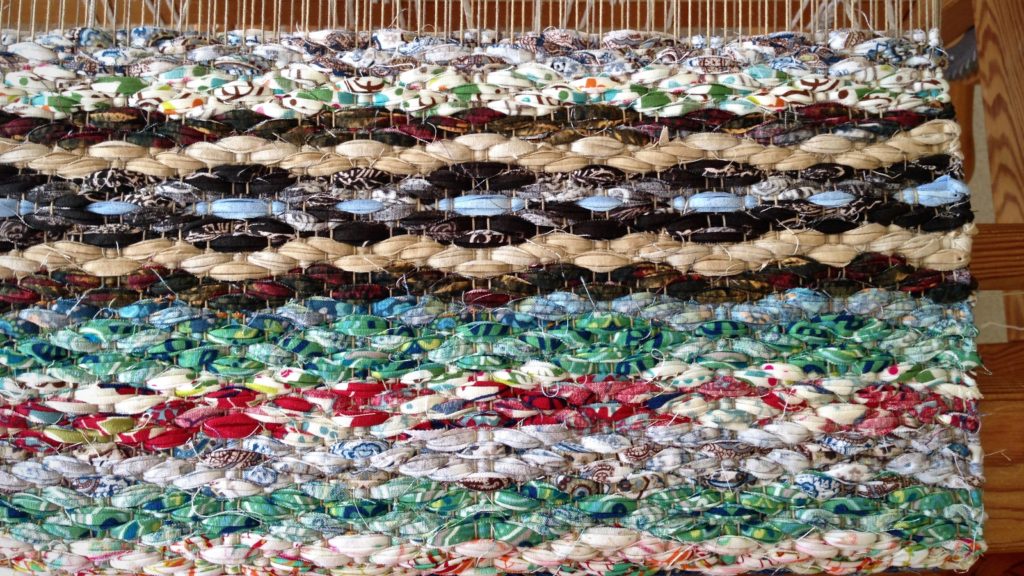 Rosepath rag rug on the loom.